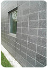 The exterior wall pieces feature a flamed finish -- providing the building with texture and depth. 