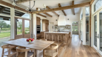 Kitchen and dining area of the Jibe Design project in Hondo, TX using Texas limestone.