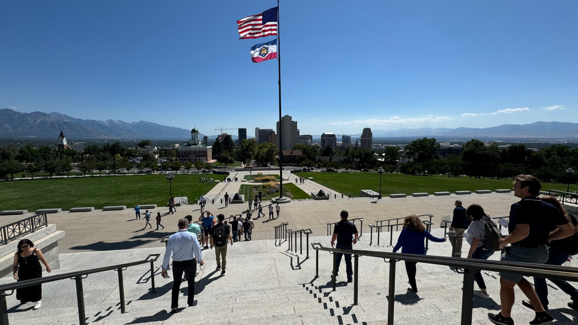 NSI Study Tour 2024 group walking down steps at Utah State Capitol