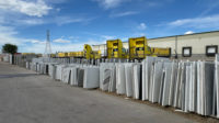 Stack of stone slabs outside of The Colorado Floor Co. fabrication shop in Henderson, CO.